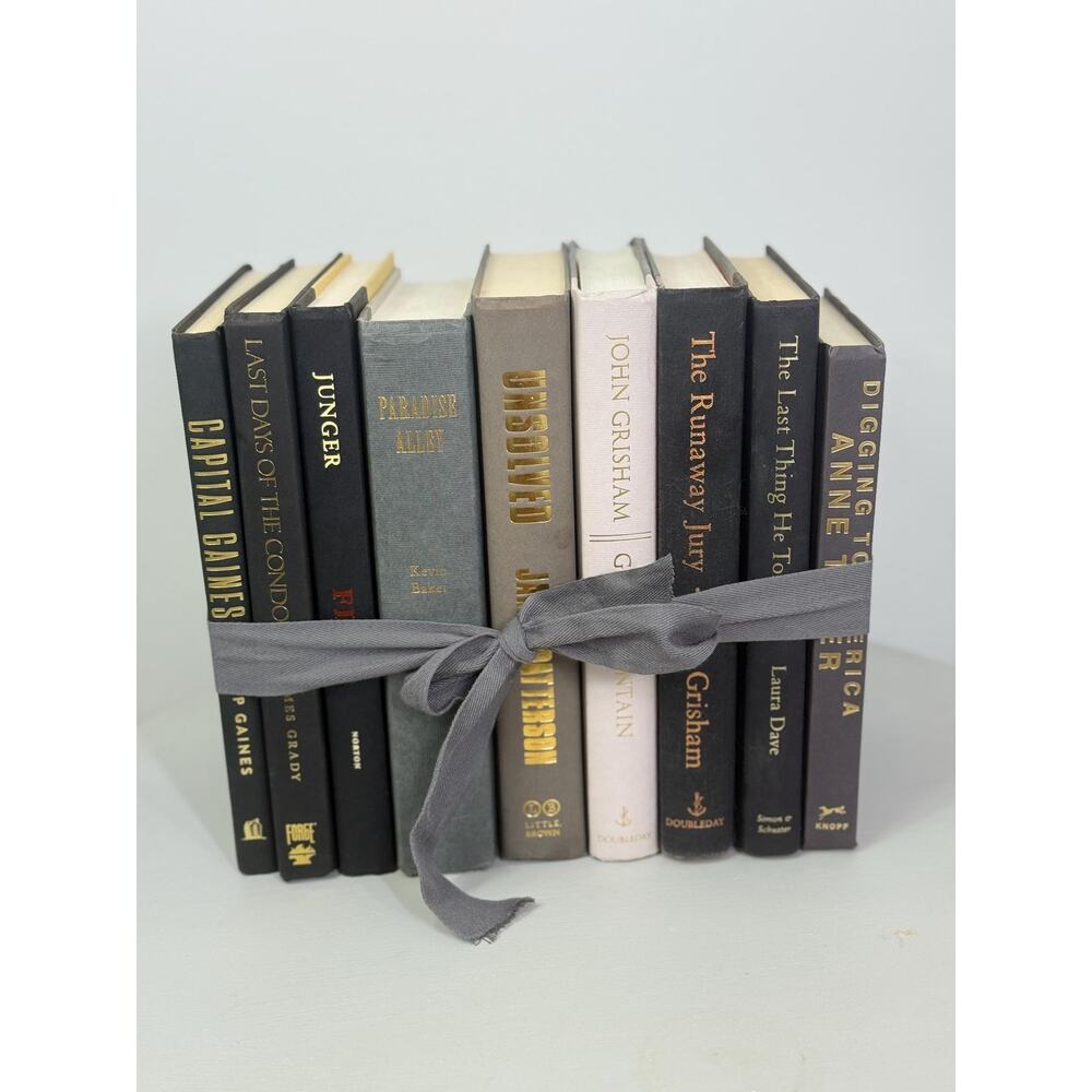 black book collection , black book stack, black and grey and white vintage books